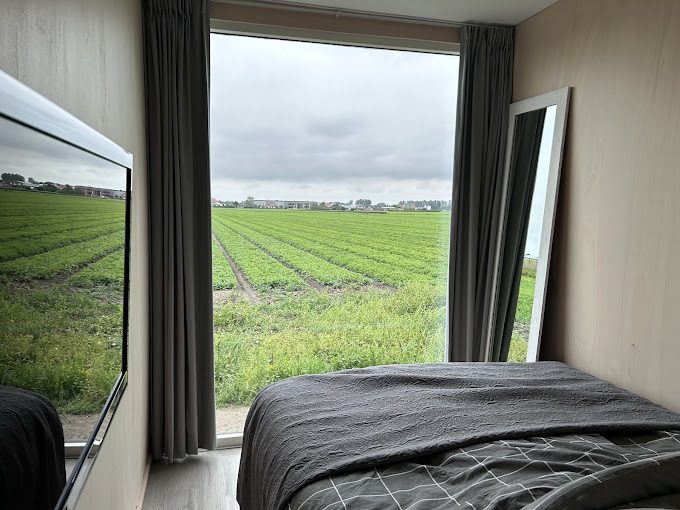 Slaapkamer met uitzicht op het veld